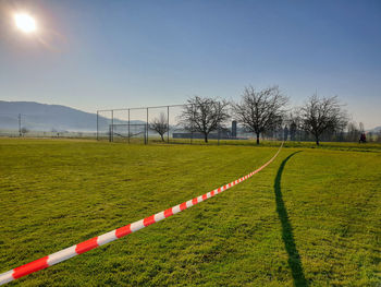 Scenic view of field against clear sky