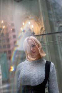 Multiple image of woman and modern building