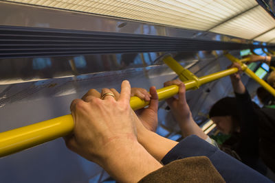 High angle view of people holding hands