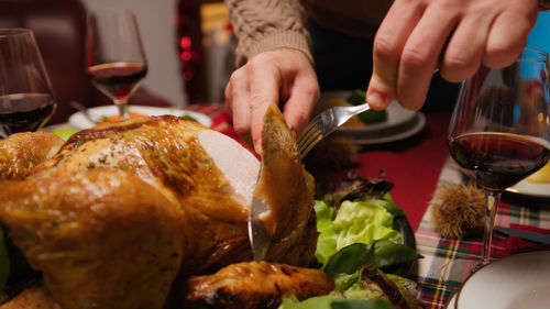 Midsection of man preparing food