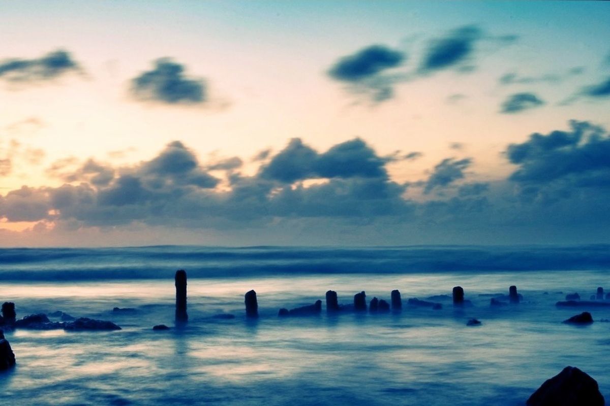 sea, sky, scenics, tranquil scene, water, beauty in nature, tranquility, horizon over water, sunset, beach, nature, cloud - sky, idyllic, cloud, blue, shore, outdoors, non-urban scene, dusk, reflection