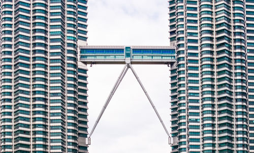 Low angle view of skyscrapers against sky