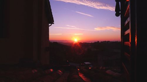 Cityscape against sky during sunset