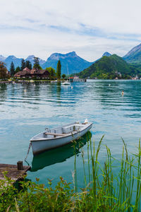 Wooden boat on the lake of annecy in the french alps