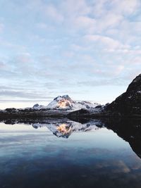 Scenic view of frozen lake against sky