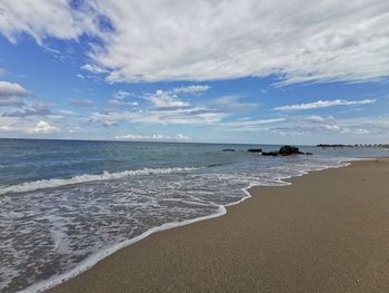 Scenic view of beach against sky