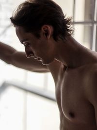 Portrait of shirtless man