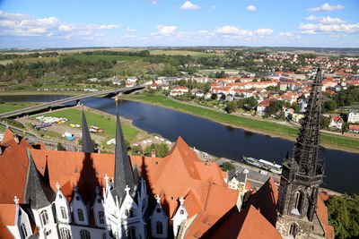 High angle view of meissen cathedral and elbe river against sky in town