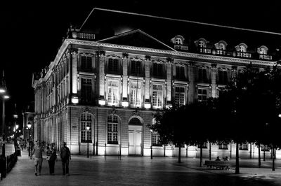 Illuminated building at night