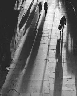 Woman walking on road