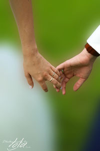 Cropped image of woman holding hands