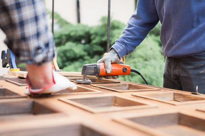 Low section of people working at construction site