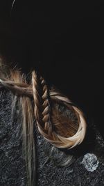 High angle view of rope tied up in basket