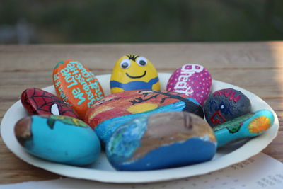 Close-up of toys in plate on table