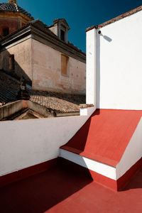 Built structure against blue sky on sunny day