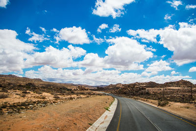 View of road against cloudy sky