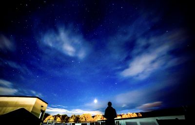 Low angle view of building against sky at night