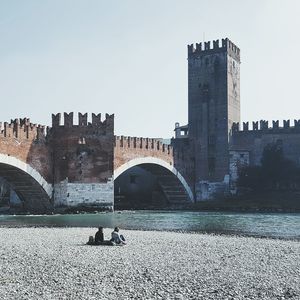 View of bridge over water against clear sky