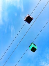 Low angle view of cable against sky