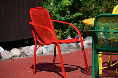Red empty outdoor chair
