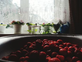 Close-up of fruits in bowl at home