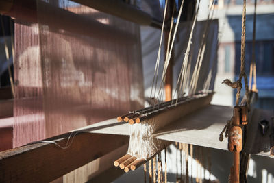 Close-up of loom at factory