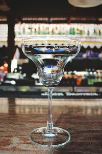 Close-up of empty drinking glass on table at nightclub