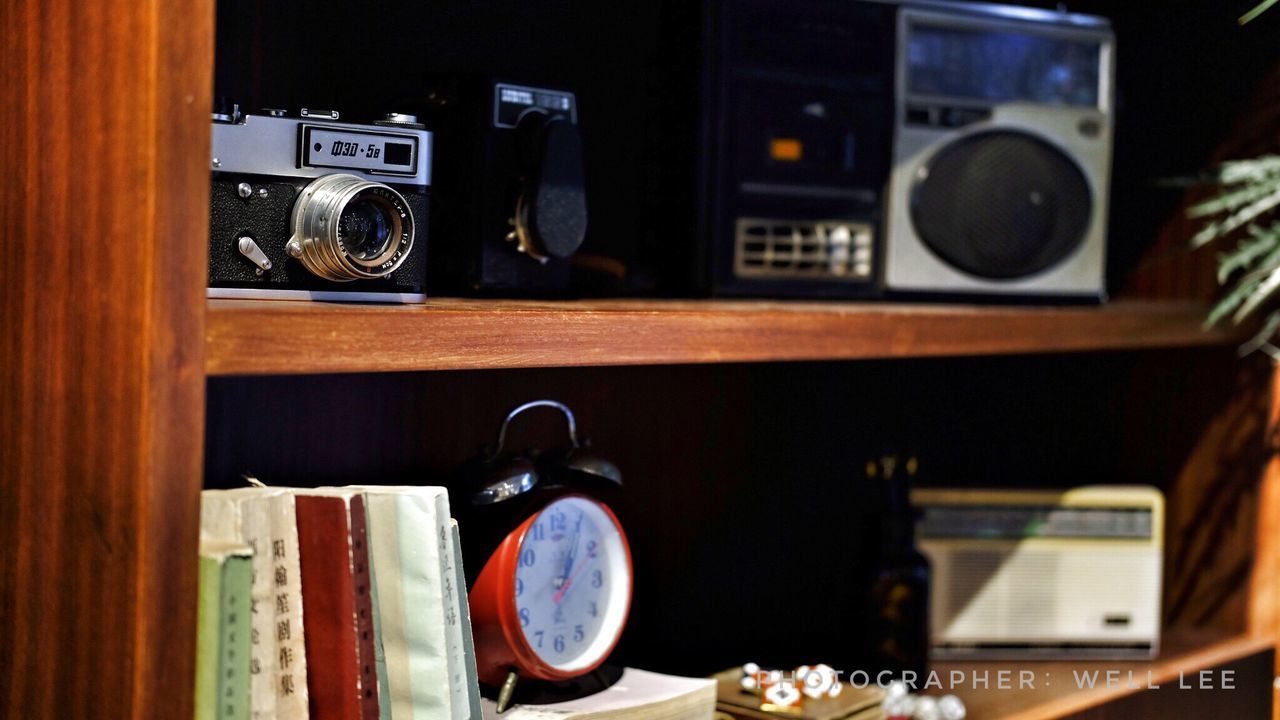 CLOSE-UP OF VINTAGE CAMERA IN MUSIC CONCERT