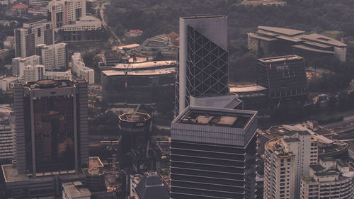 High angle view of buildings in city against sky