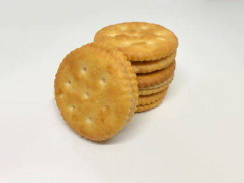 Close-up of cookies against white background