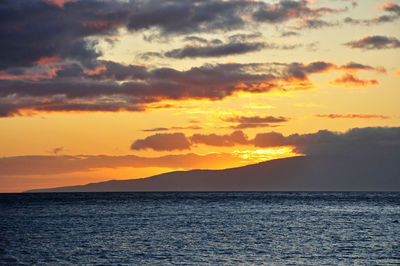 Scenic view of sea against sky during sunset