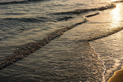 High angle view of sea shore during sunset