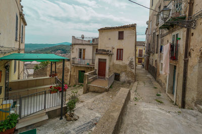 Alley amidst buildings in town