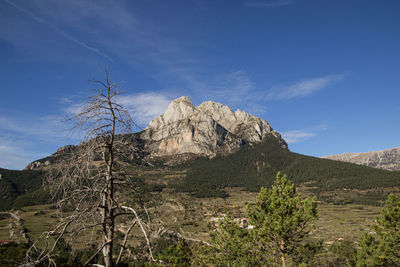 Scenic view of rocky mountains against sky