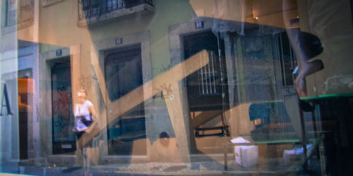 People on glass window