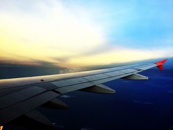 Cropped image of airplane wing