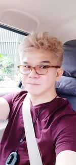 Portrait of boy wearing hat at home