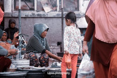 Group of people in market