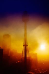 Silhouette of tower during sunset