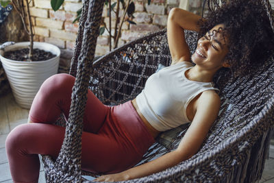 Low angle view of woman sitting on boat