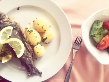 Close-up of served food in plate