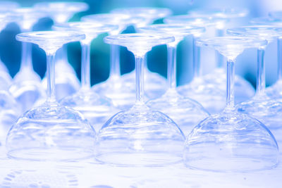 Close-up of wine glass against blue background