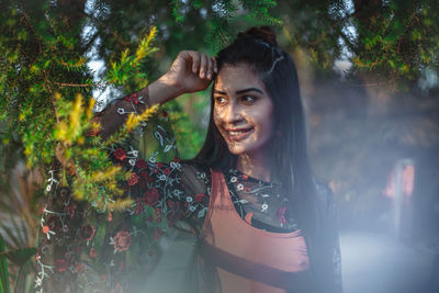 Portrait of smiling young woman