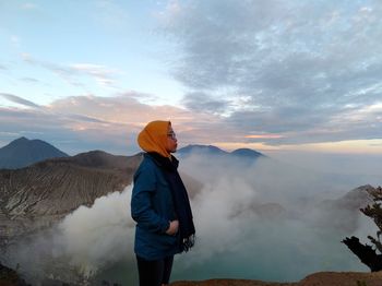 Young woman standing on mountain