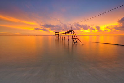 View of calm sea at sunset