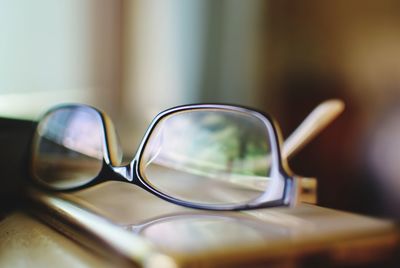 Close-up of sunglasses on table