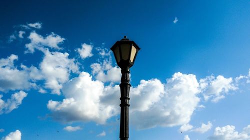 Low angle view of street light against sky