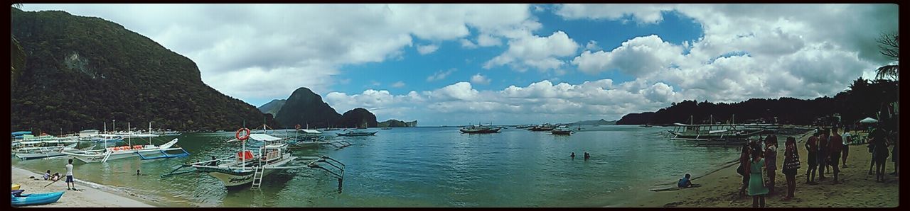 transfer print, sky, water, auto post production filter, panoramic, cloud - sky, sea, cloud, nautical vessel, transportation, cloudy, tranquility, scenics, mountain, tranquil scene, nature, beauty in nature, mode of transport, moored, boat