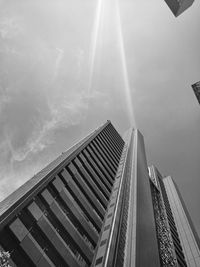 Low angle view of skyscrapers against sky