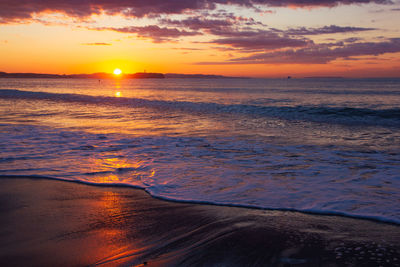 Scenic view of sea against sky during sunset